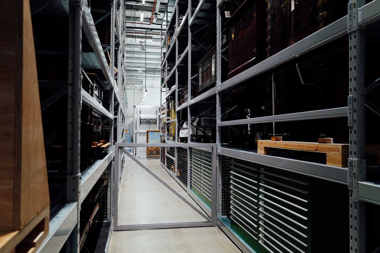 Orderly metal storage racks inside an industrial warehouse